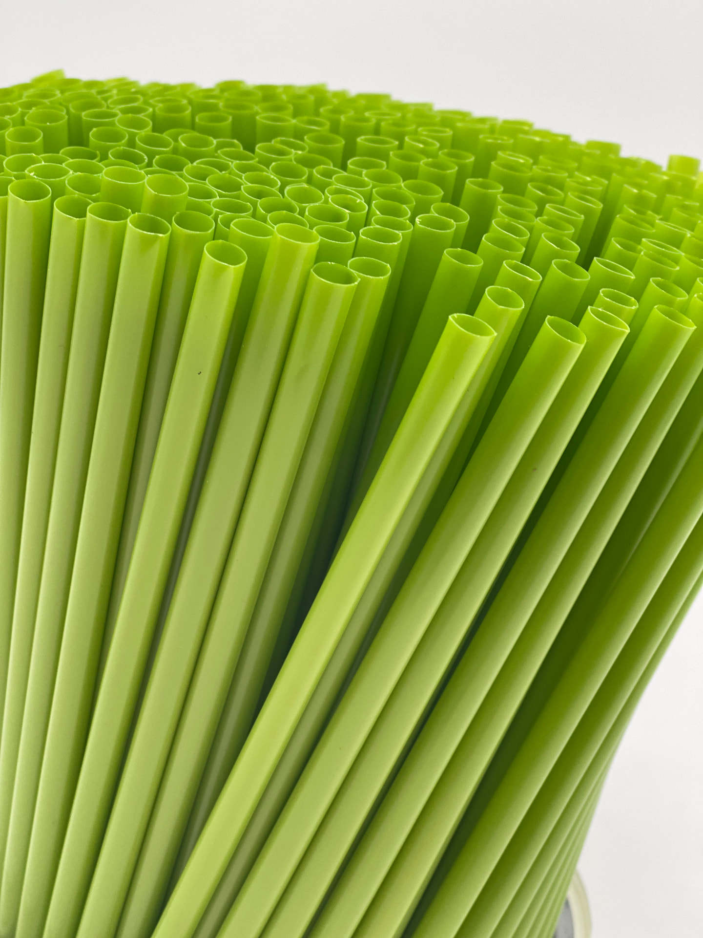 Close view of green drinking straws